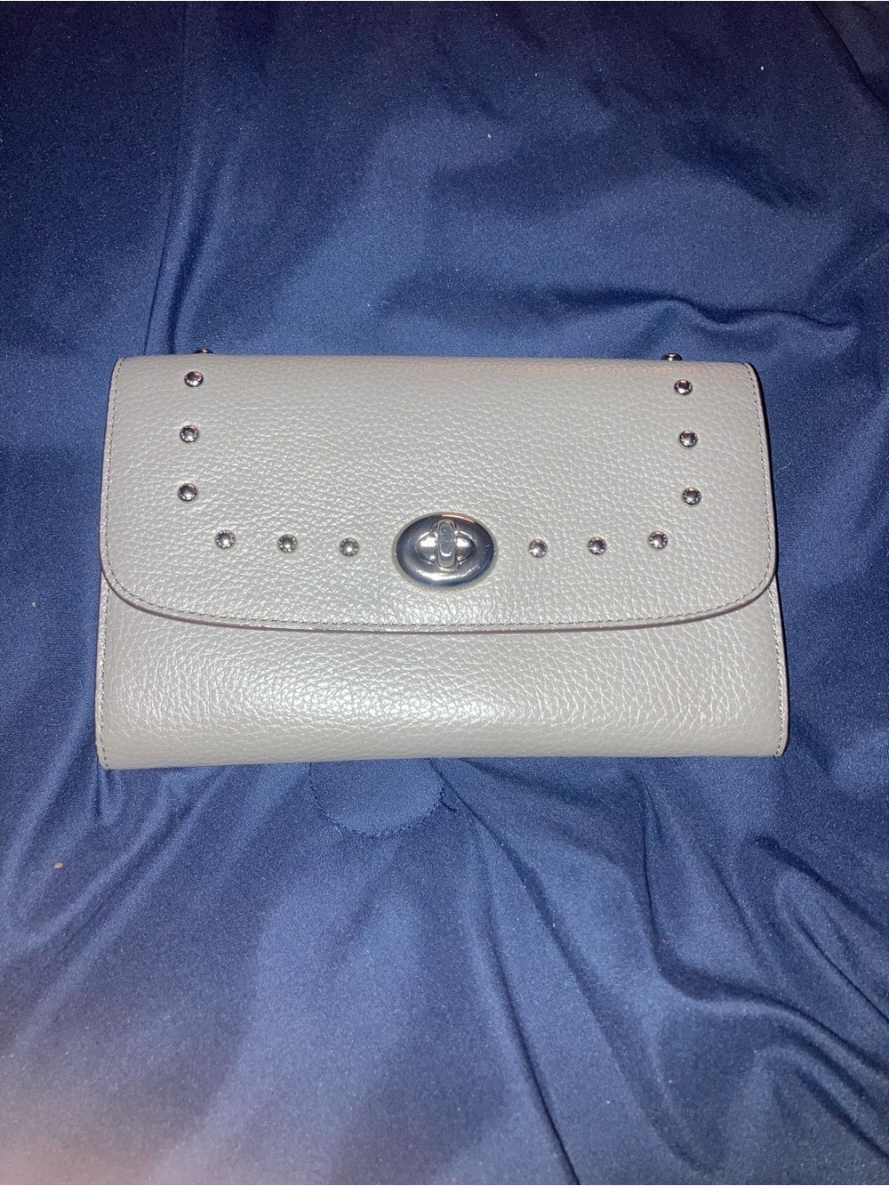 Coach Pebbled Leather Clutch in Light Gray with Silver Studs